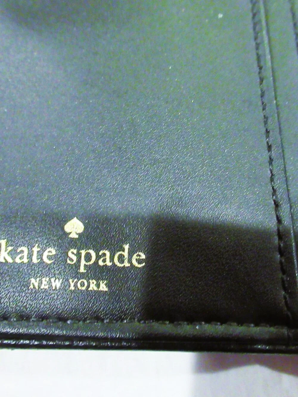 Kate Spade New York black leather wristlet / wallet